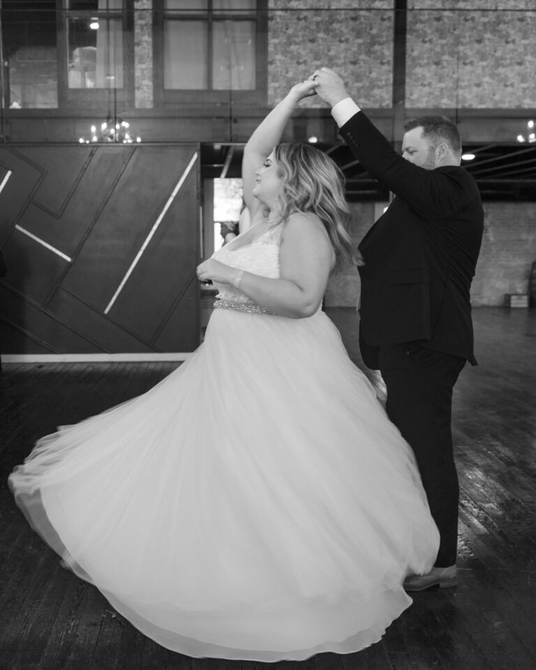 First Dance at brandt 1910 husband spins wife on dance floor