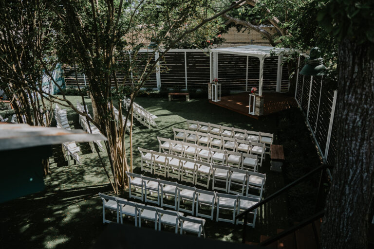 Outdoor Garden Ceremony at Brandt 1910 in Wallis, TX by Heather Purvis Photography