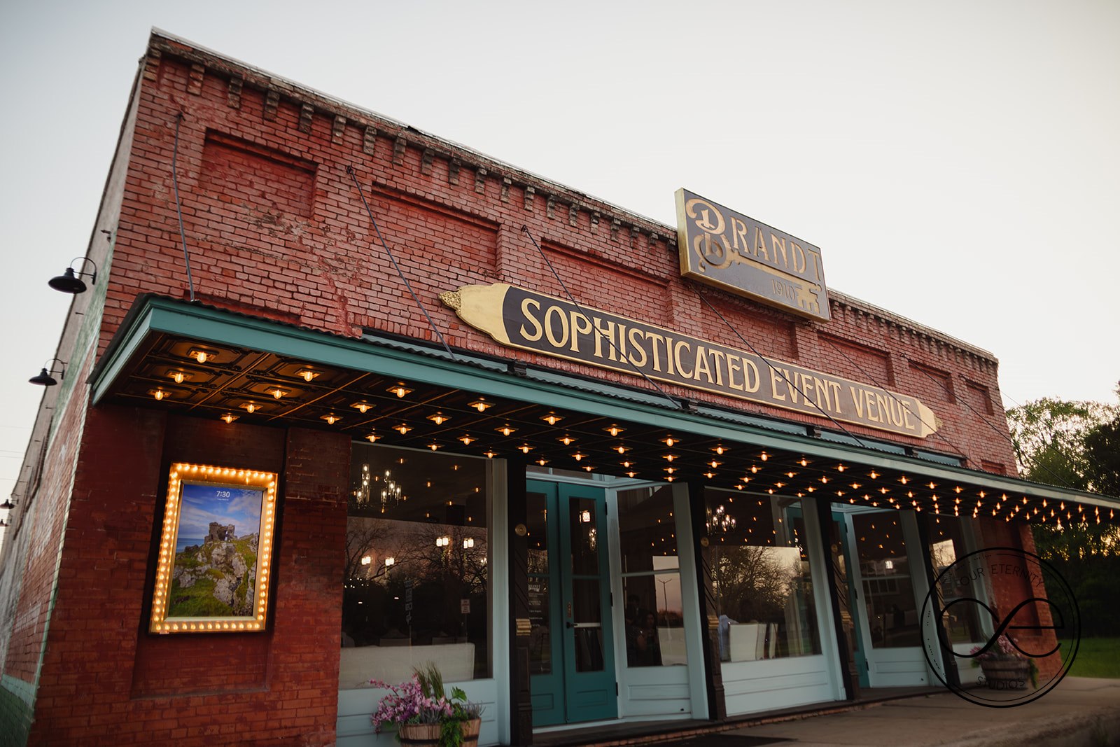 Brandt 1910 Front of a red brick sophisticated event and wedding Venue in wAllis, tx